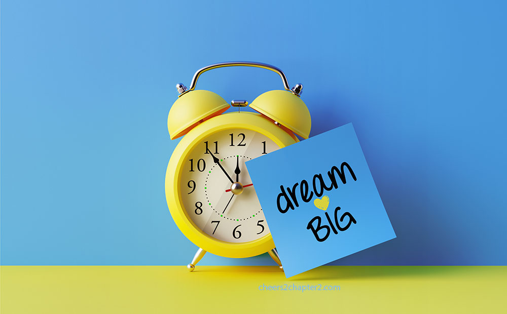 image of clock with dream big sign