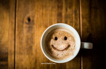 Mug of coffee with smiley face for the Feel Good Experiment page Cheers to Chapter Two