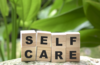 Image of letters spelling self care for Self Care Habits for Wellbeing in Good Times and Bad