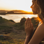 woman meditating in way to practice gratitude